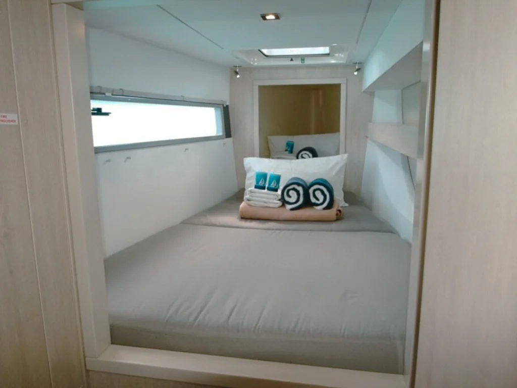 Master cabin on the 43 Leopard yacht with a comfortable bed