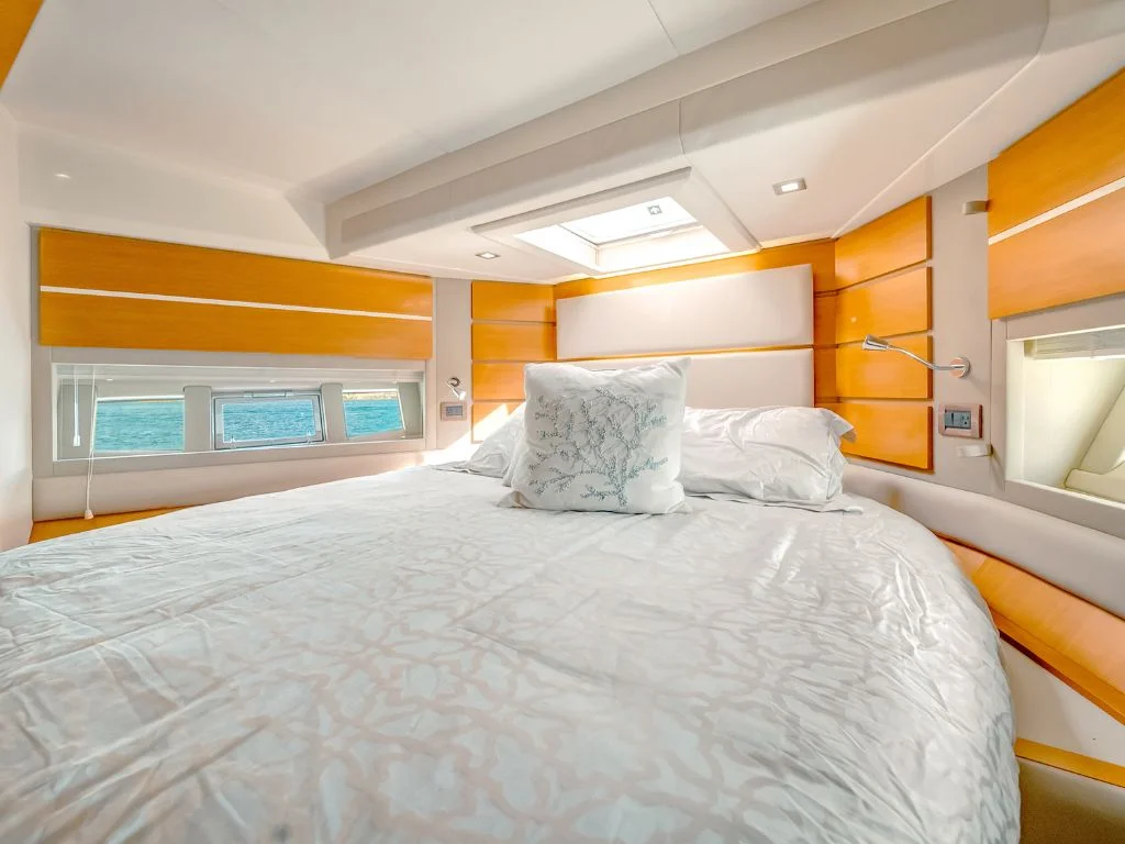 Spacious master cabin of the 60 Azimut with a large bed