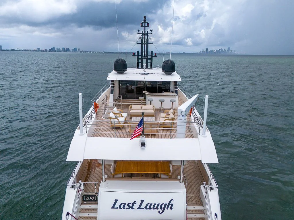 100ft Majesty yacht sailing luxurious Miami waters on a sunny day