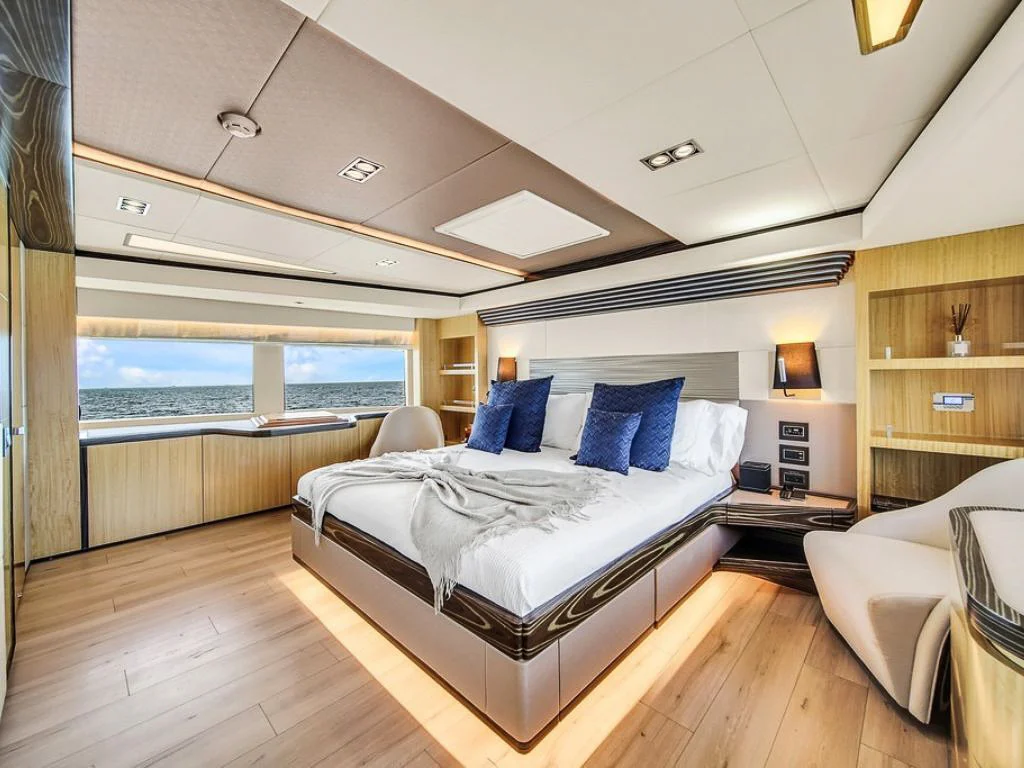 Guest cabin with large windows on 100 Majesty yacht