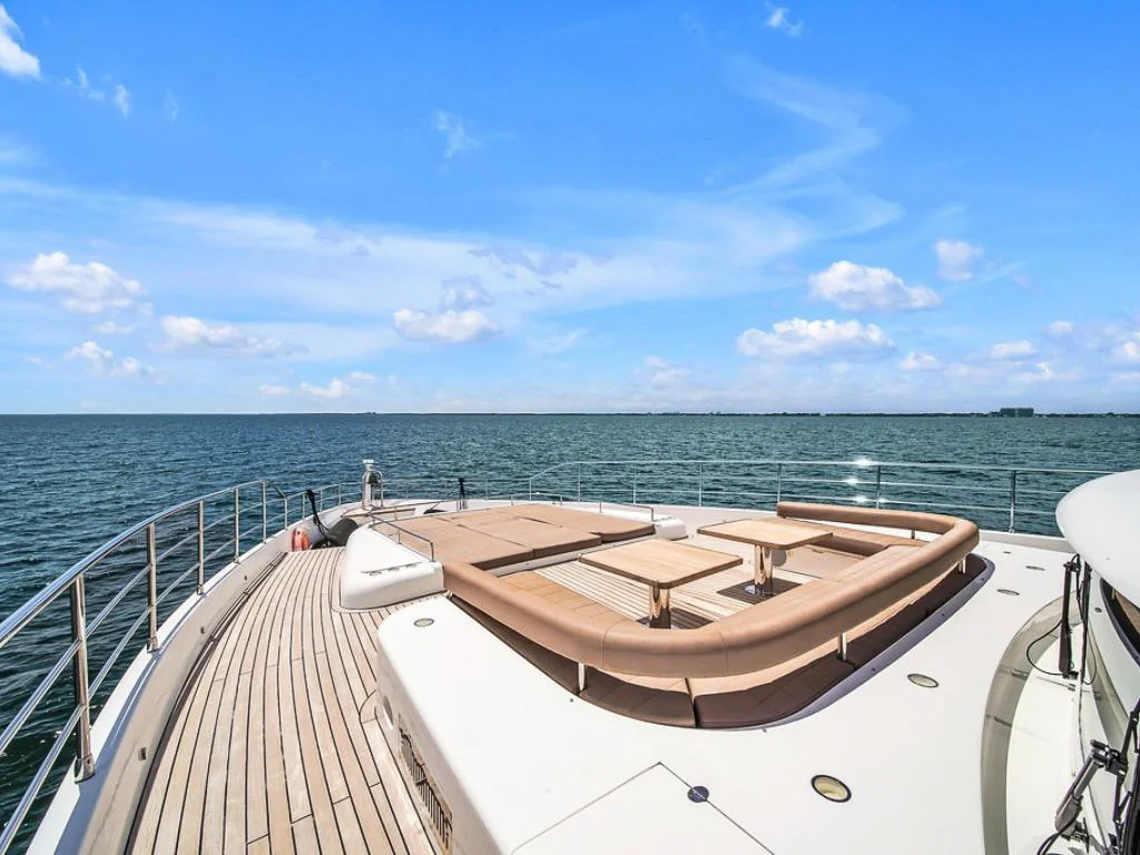 Yacht deck with seating area and ocean view