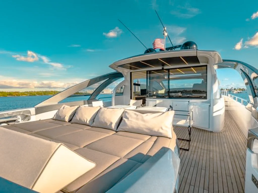 Guests enjoying the deck of the 70 Pershing yacht, perfect for relaxing