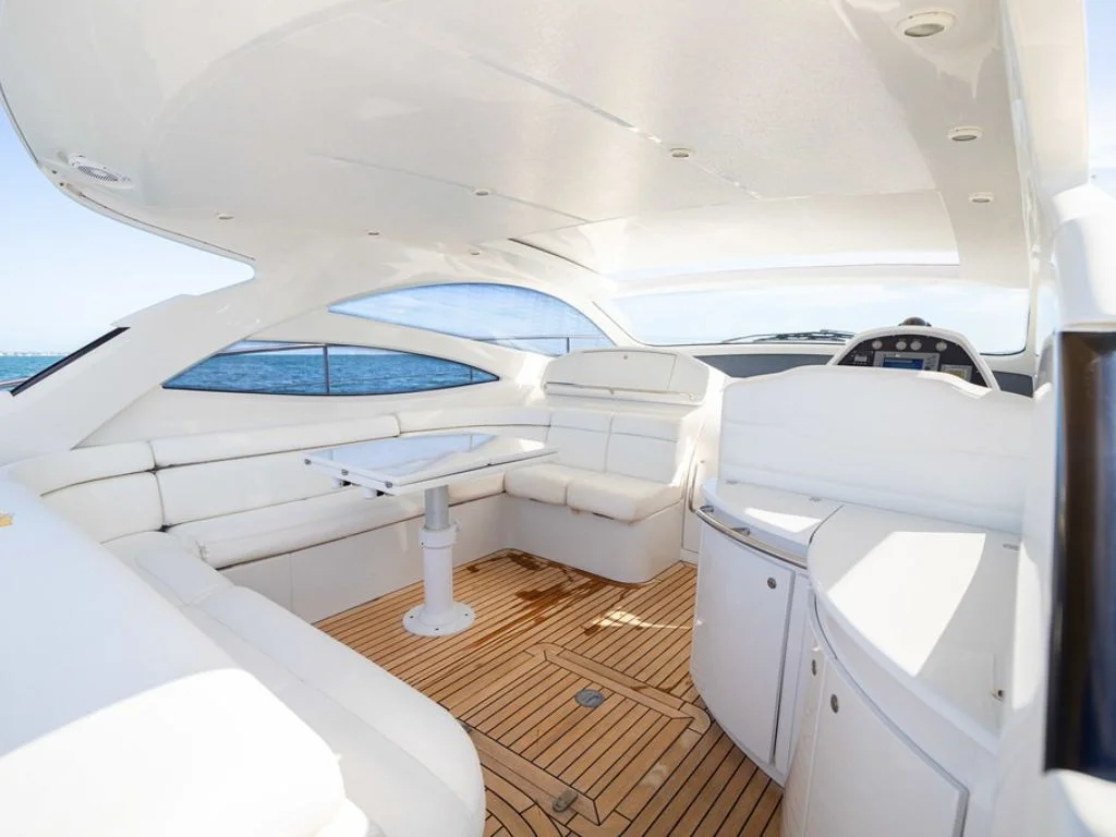 A large sundeck area with cushions on the 50 Pershing
