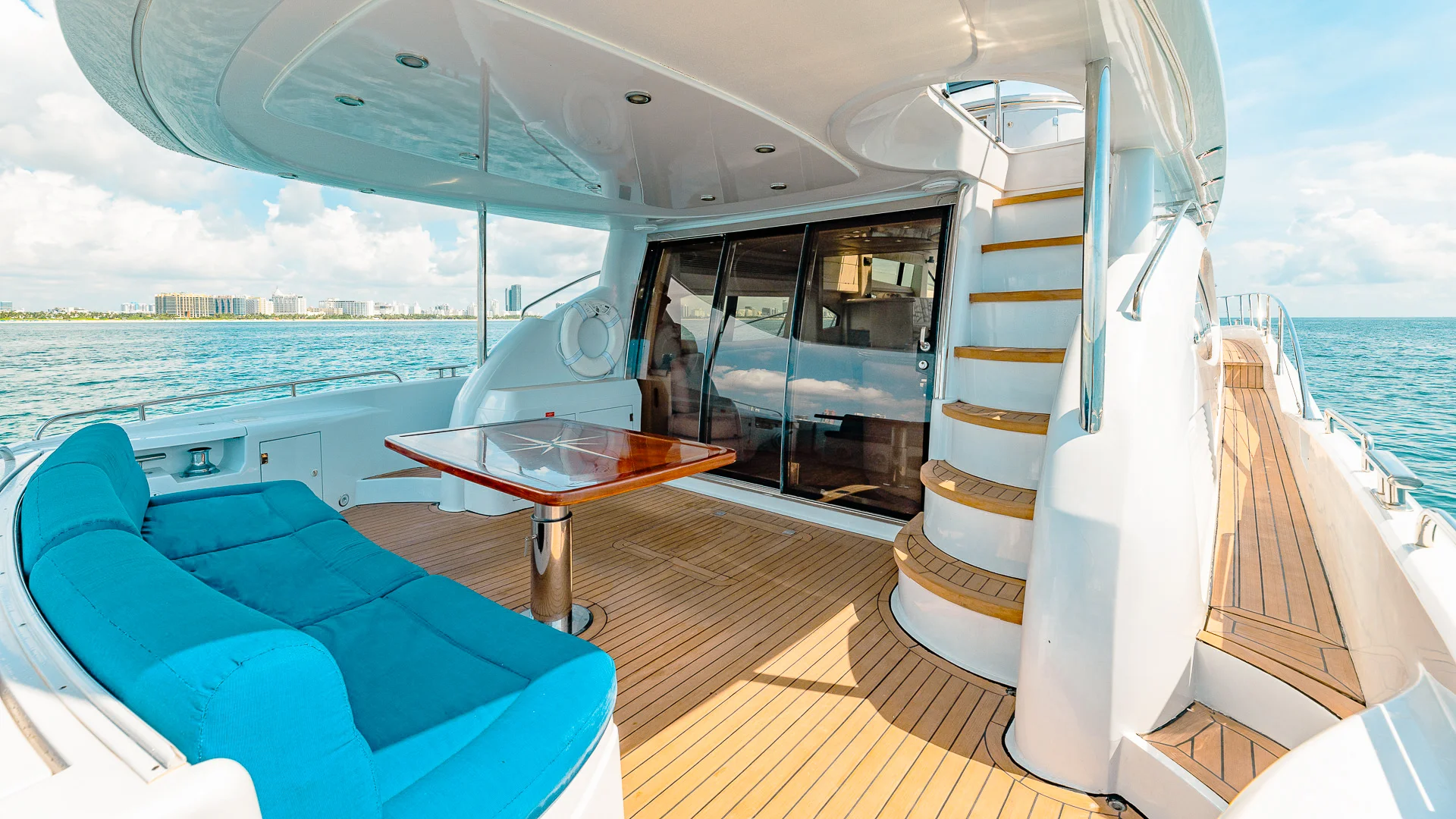 Aft deck of the 80 Sunseeker yacht with seating and a table