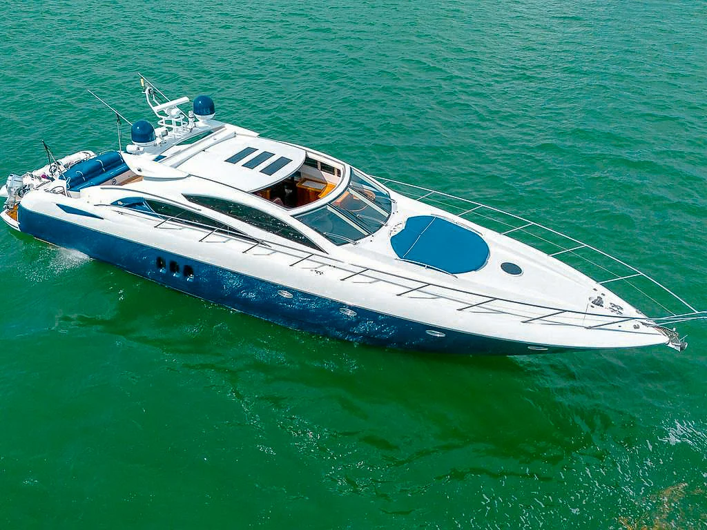 72 Sunseeker II luxury yacht charter cruising in Miami waters with guests enjoying the sun