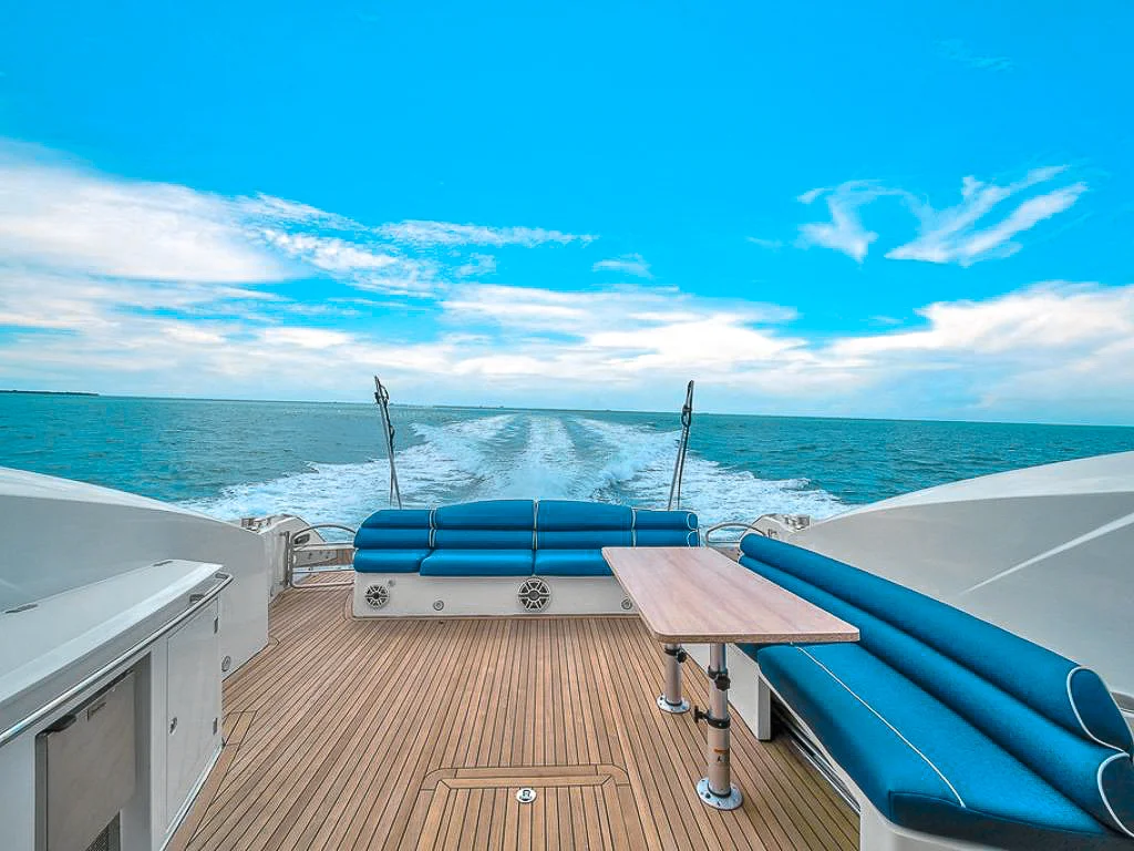 Relaxing seating area on the deck of the 72 Sunseeker II yacht under a canopy