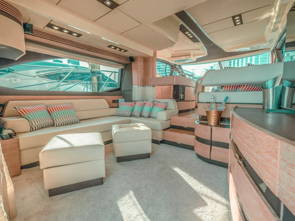 Interior seating area with a table on the 55 Azimut IV