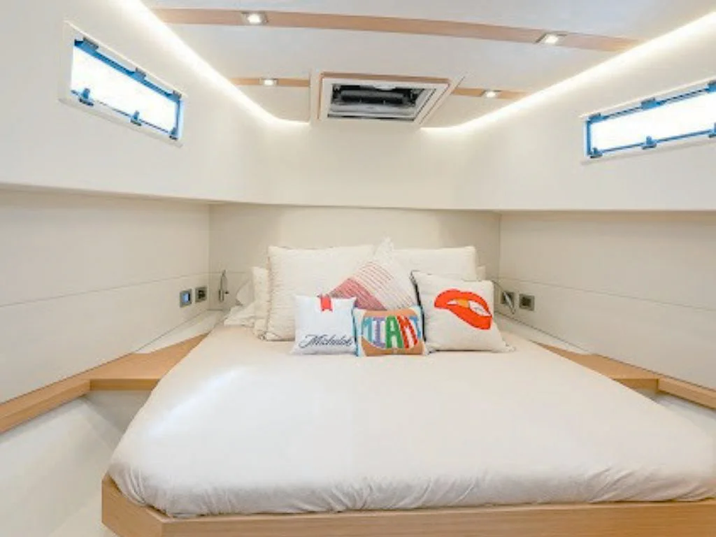 Bedroom interior of the 38 Pardo yacht, showing a comfortable bed