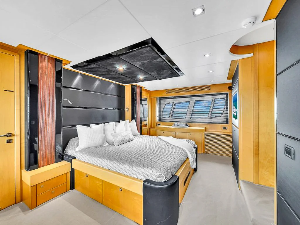 Closer view of a cabin with a large bed on the 80 Sunseeker II