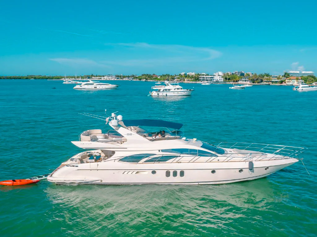 The stunning Sanlorenzo SL106 luxury yacht cruising in clear blue waters with sun shining.