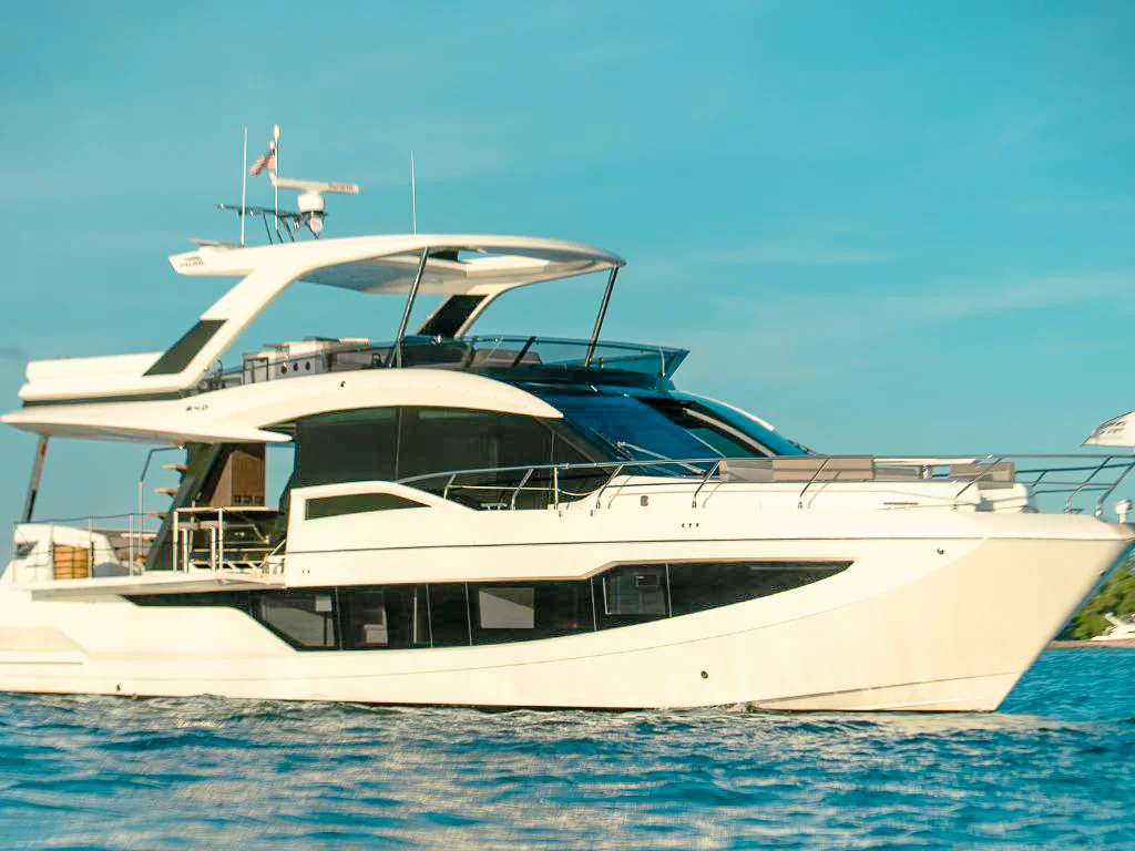 68 Galeon IV yacht exterior with guests relaxing