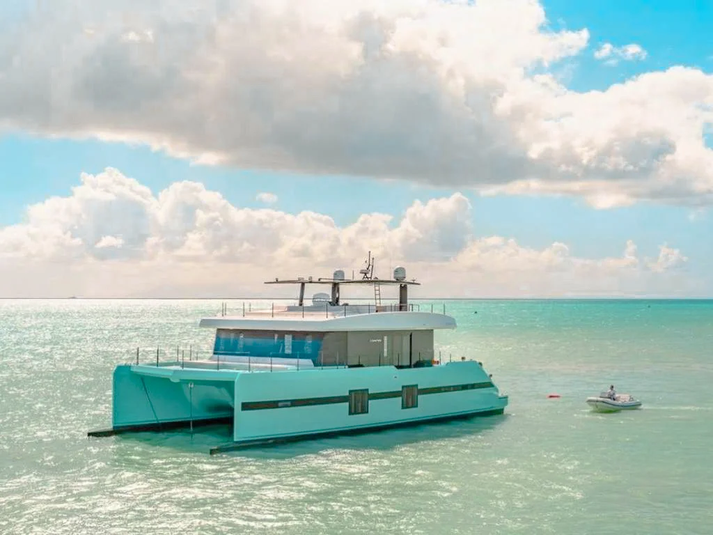 Luxury 70ft Sunreef II yacht docked in Miami, ready for a private charter experience.