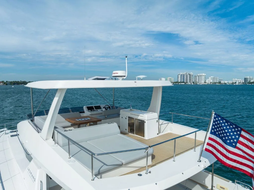 Deck area of the 60 Leopard with seating and sunpads