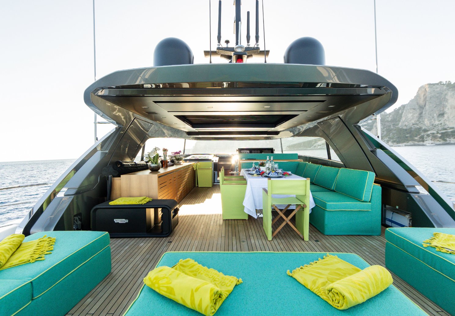 A group enjoying the aft deck of 90 SanLorenzo yacht