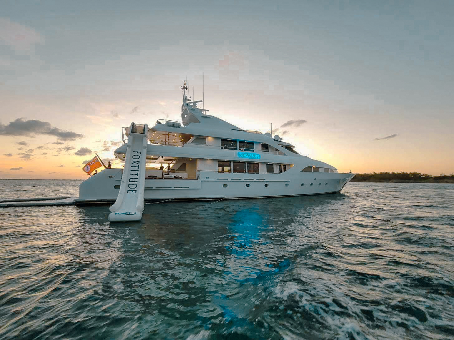 Luxury 136ft Intermarine Savannah yacht cruising through the beautiful blue waters of the Bahamas.