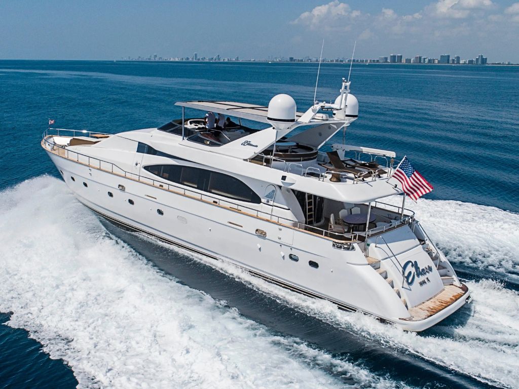 Luxurious 85ft Azimut yacht docked in Miami ready for private charter, showcasing its sleek design.