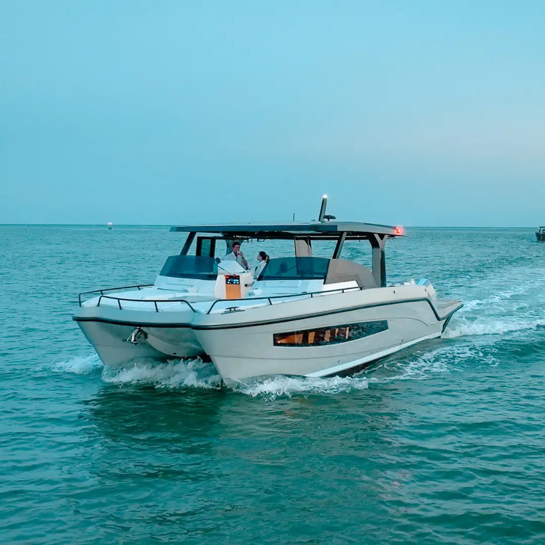 A luxurious 38ft Tesoro yacht docked in Miami, ready for a private charter adventure.