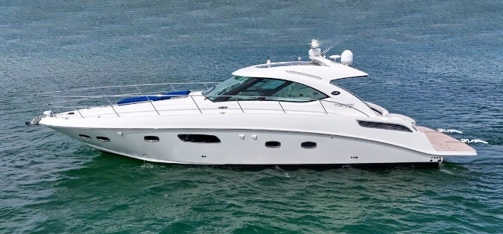 Exterior view of the 47 Sea Ray yacht cruising through Miami waters