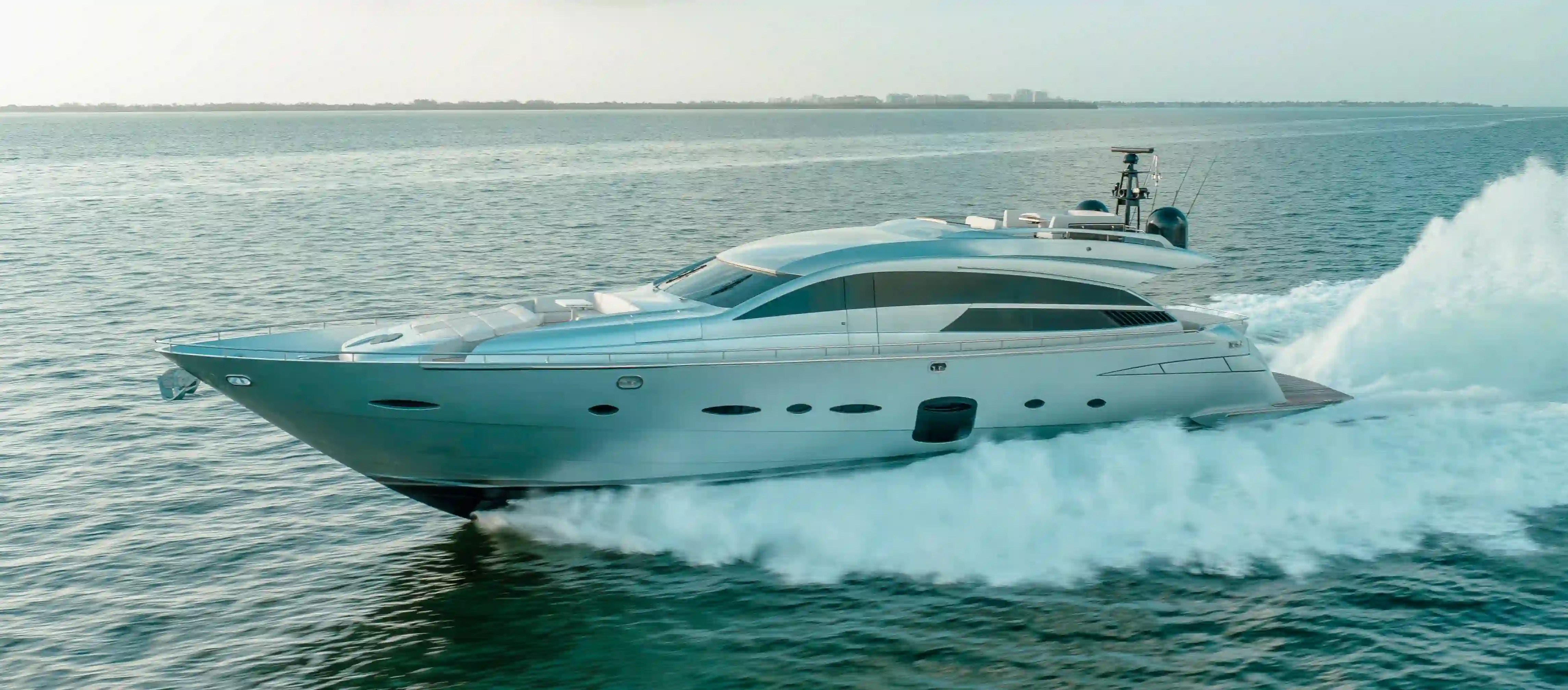Exterior view of the 92 Pershing yacht on the water in Miami
