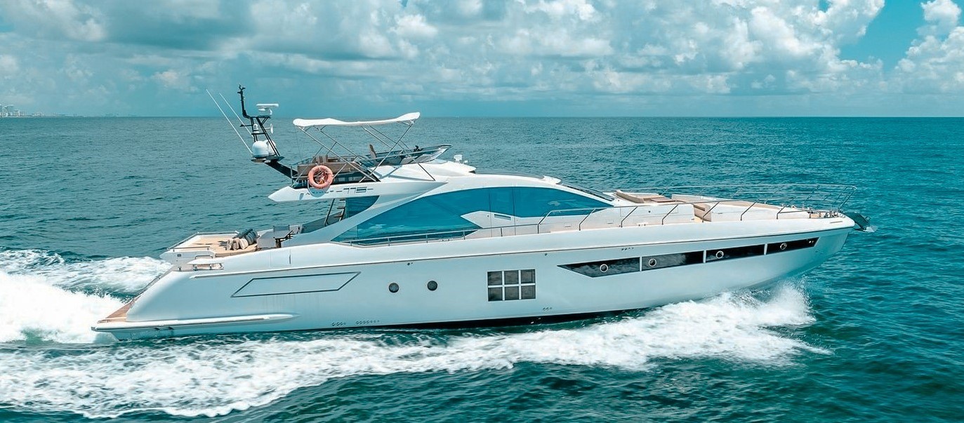 Exterior view of the 77 Azimut yacht cruising in Miami