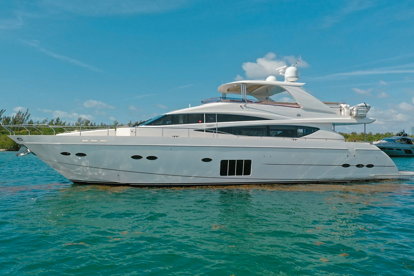 Exterior view of the 85 Princess yacht cruising in Miami