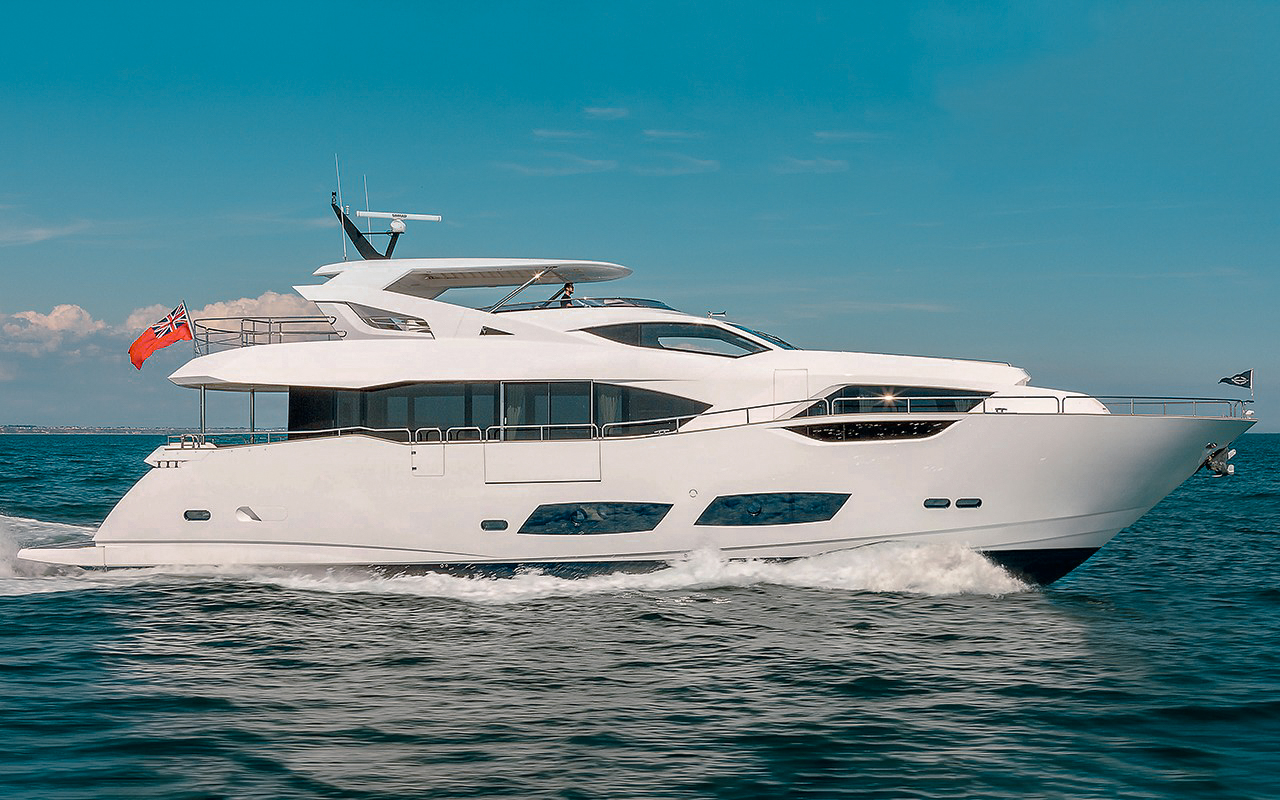 Couple enjoying a romantic Ft. Lauderdale yacht charter on a luxury vessel.
