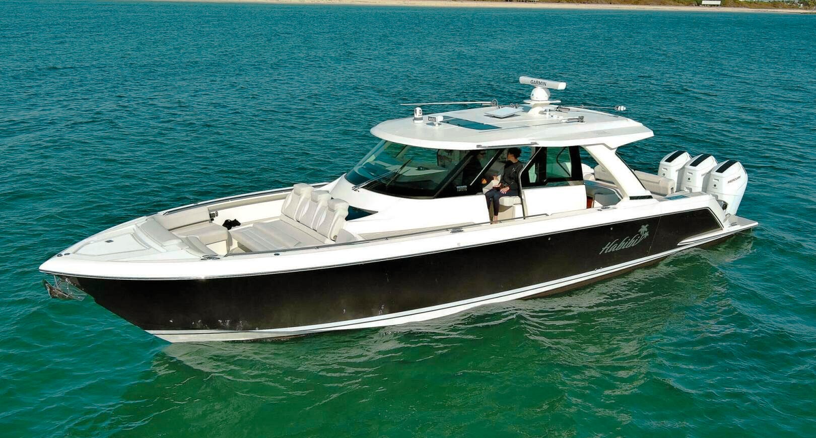 Exterior view of the 48 Tiara yacht cruising on open water