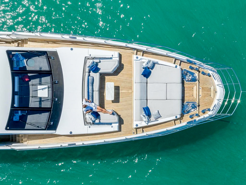 Aft deck of the 88 Azimut yacht with seating and dining area