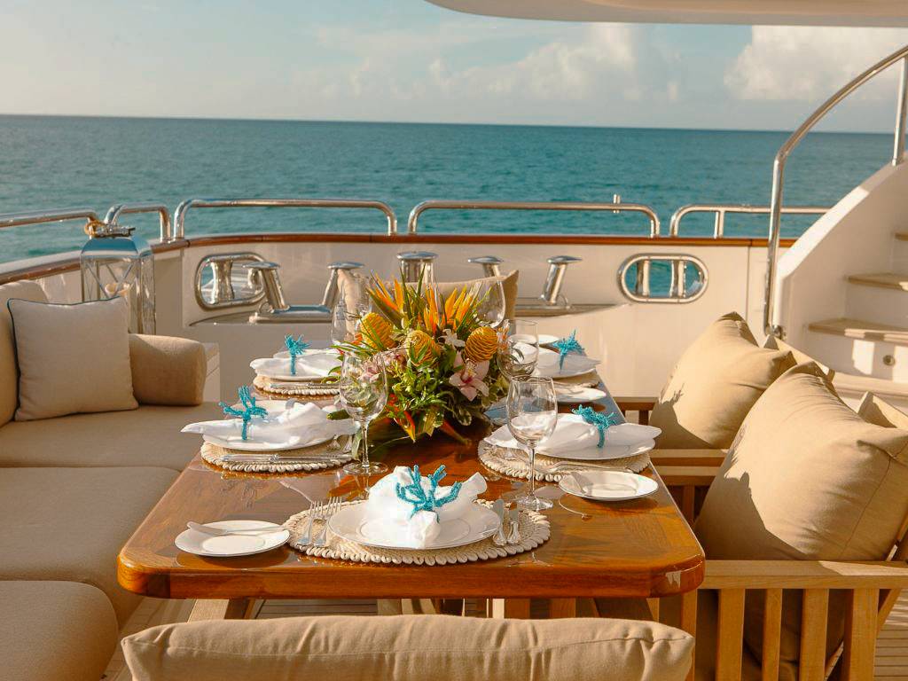 View of the 143 Benetti yacht's aft deck with dining area