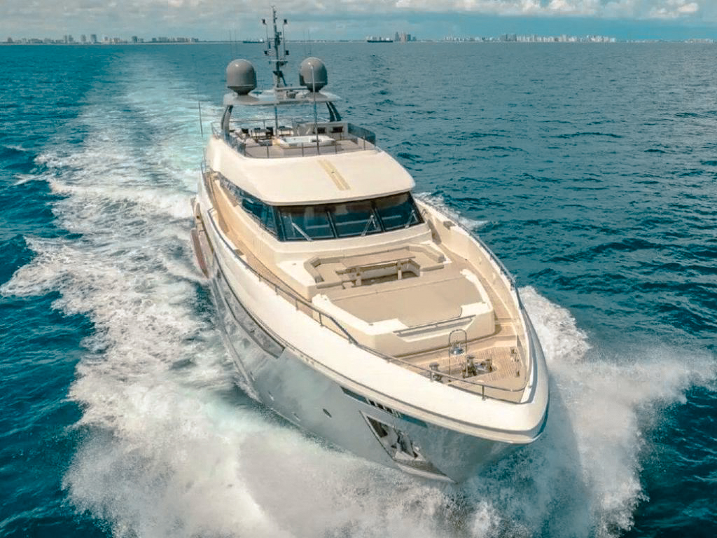 Side view of the 108 Ferretti yacht docked in The Bahamas marina