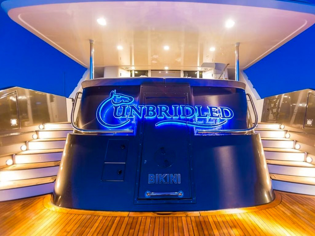 Deck area of the 116 Crescent yacht with lounge seating
