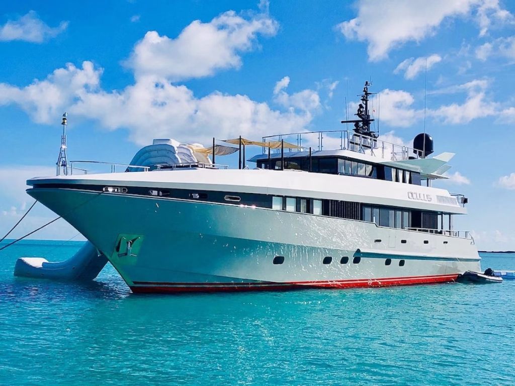Aft deck of 128 Oceanfast yacht with dining area