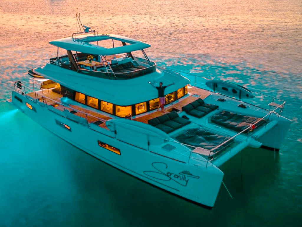 Side view of 64 Lagoon II on the open ocean