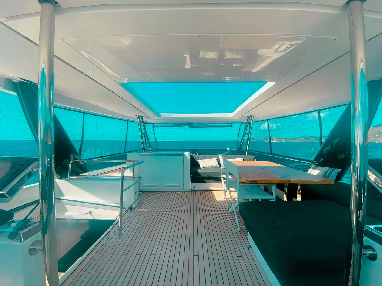Dining table on the back deck of the 64 Lagoon yacht