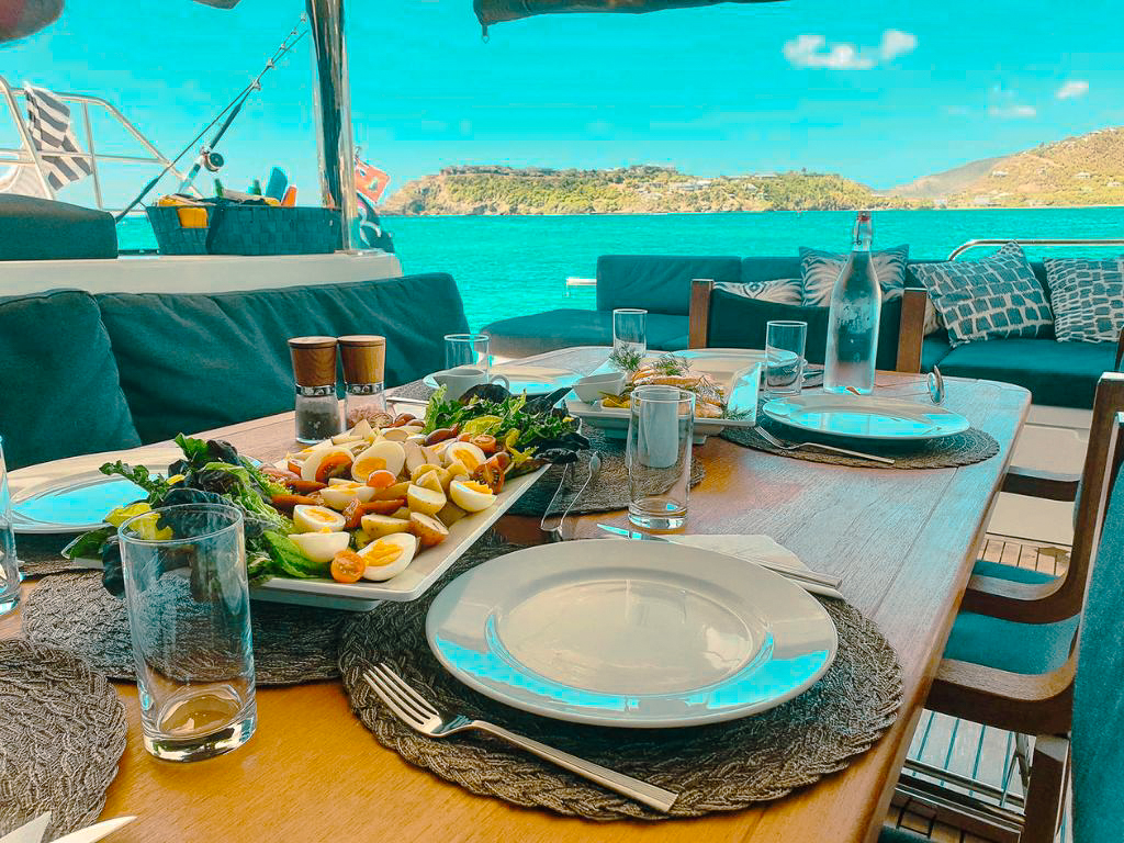 View of the ocean from the bow of the 64 Lagoon yacht