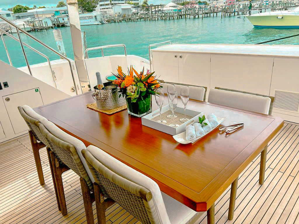 Aft deck of the 87 Horizon yacht with dining area