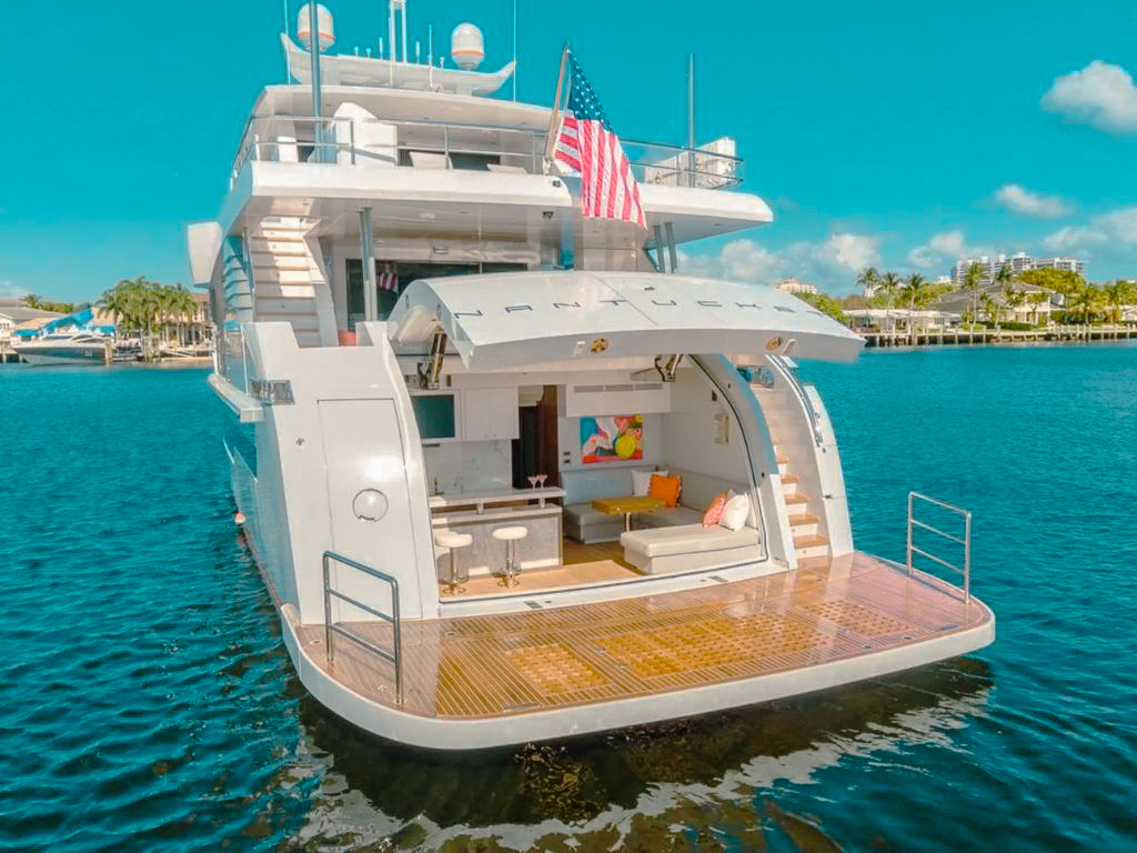 92 Hargrave yacht's sun deck with lounge chairs and ocean views