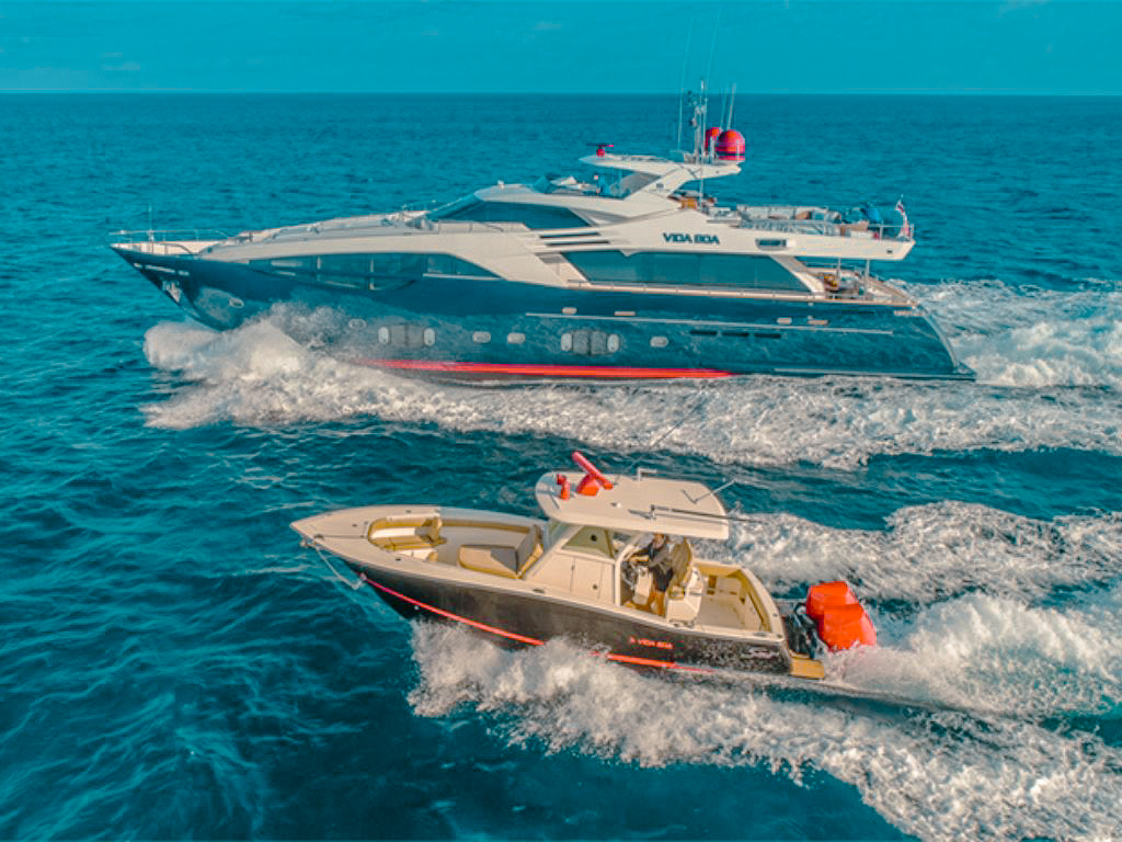 A wide deck of the 100 Ferretti showing seating and the ocean view