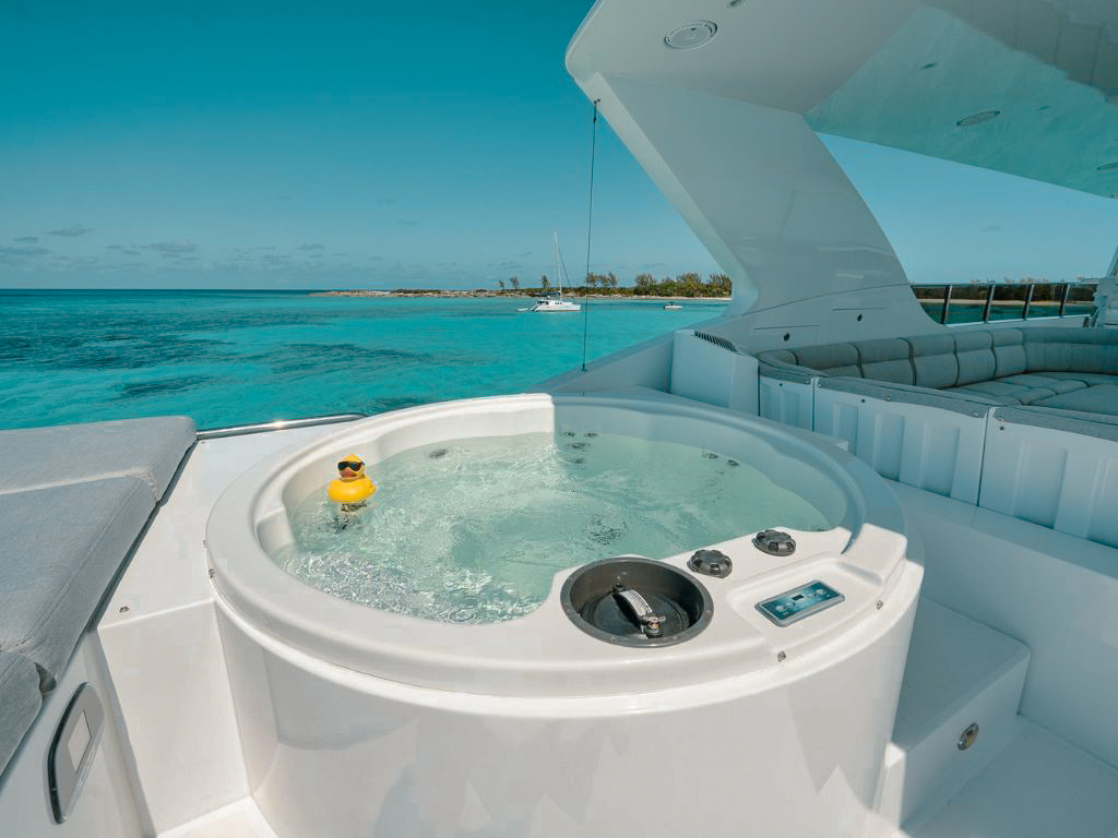 Bow of 101 Hargrave yacht with seating area and ocean views