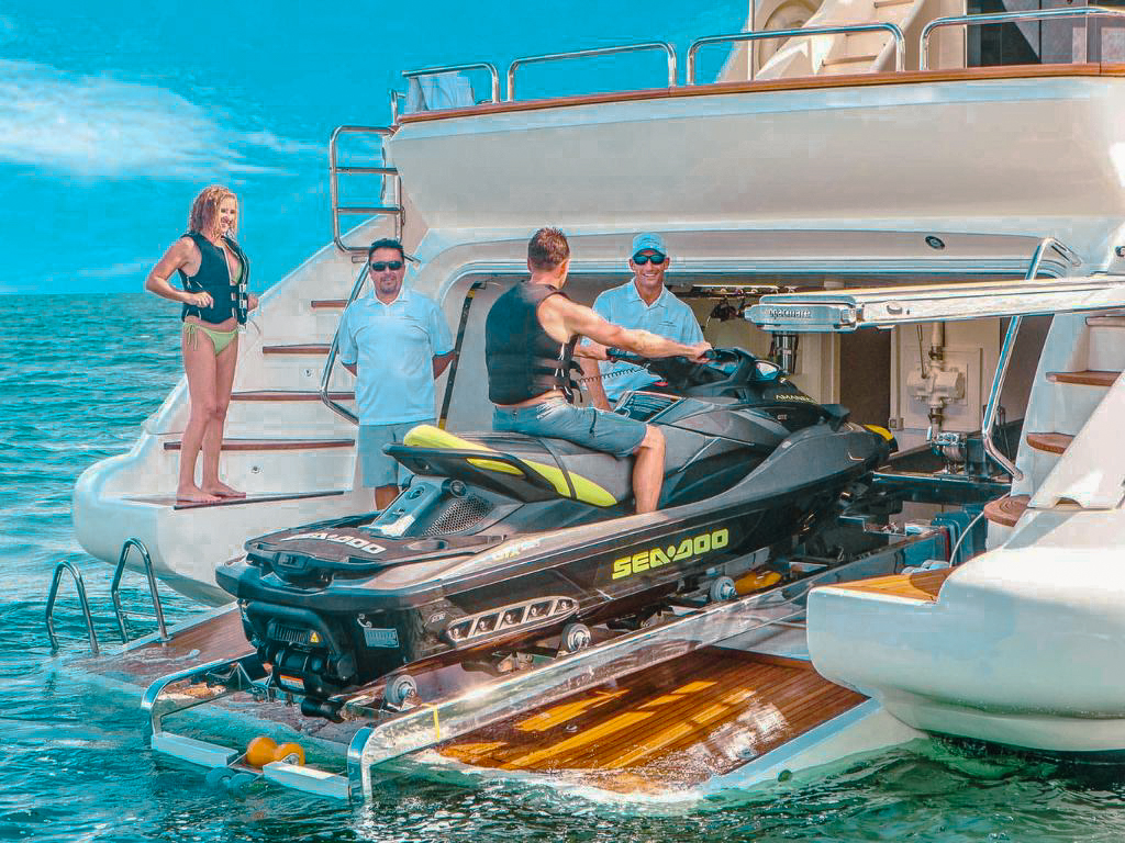 Side view of the 105 Azimut yacht cruising in clear waters