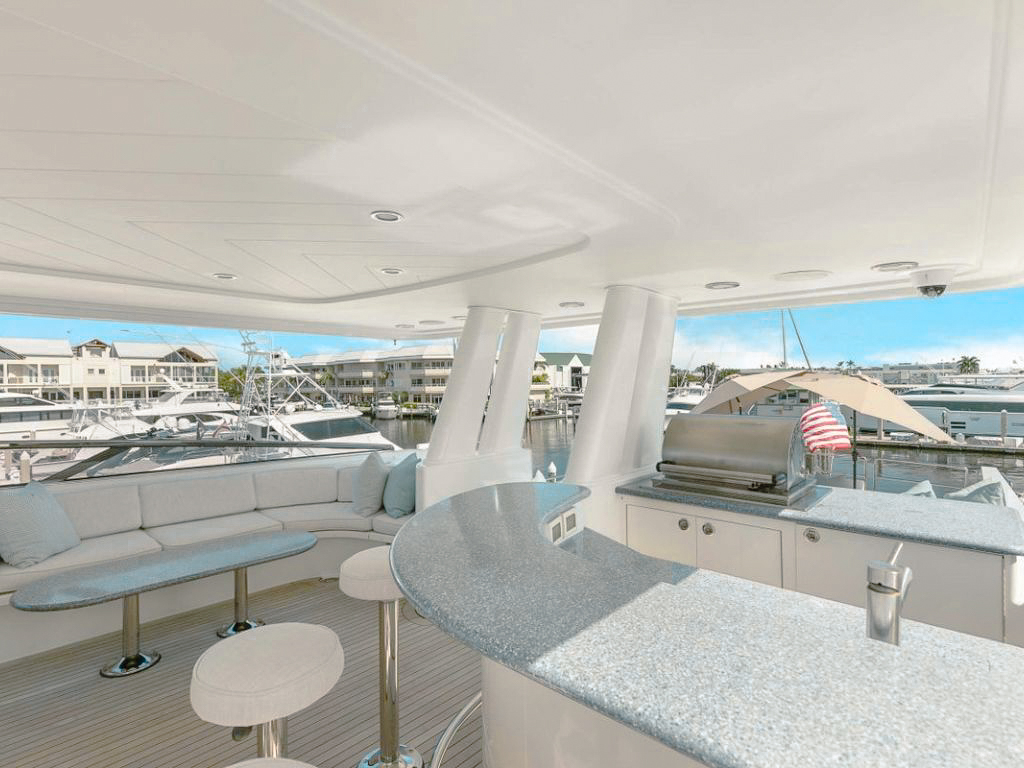 Guests relaxing on the deck of 112 Westport yacht