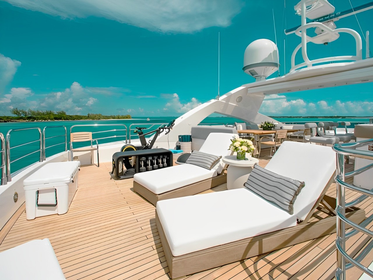 131 Sunseeker yacht at anchor near a beautiful beach in the Bahamas