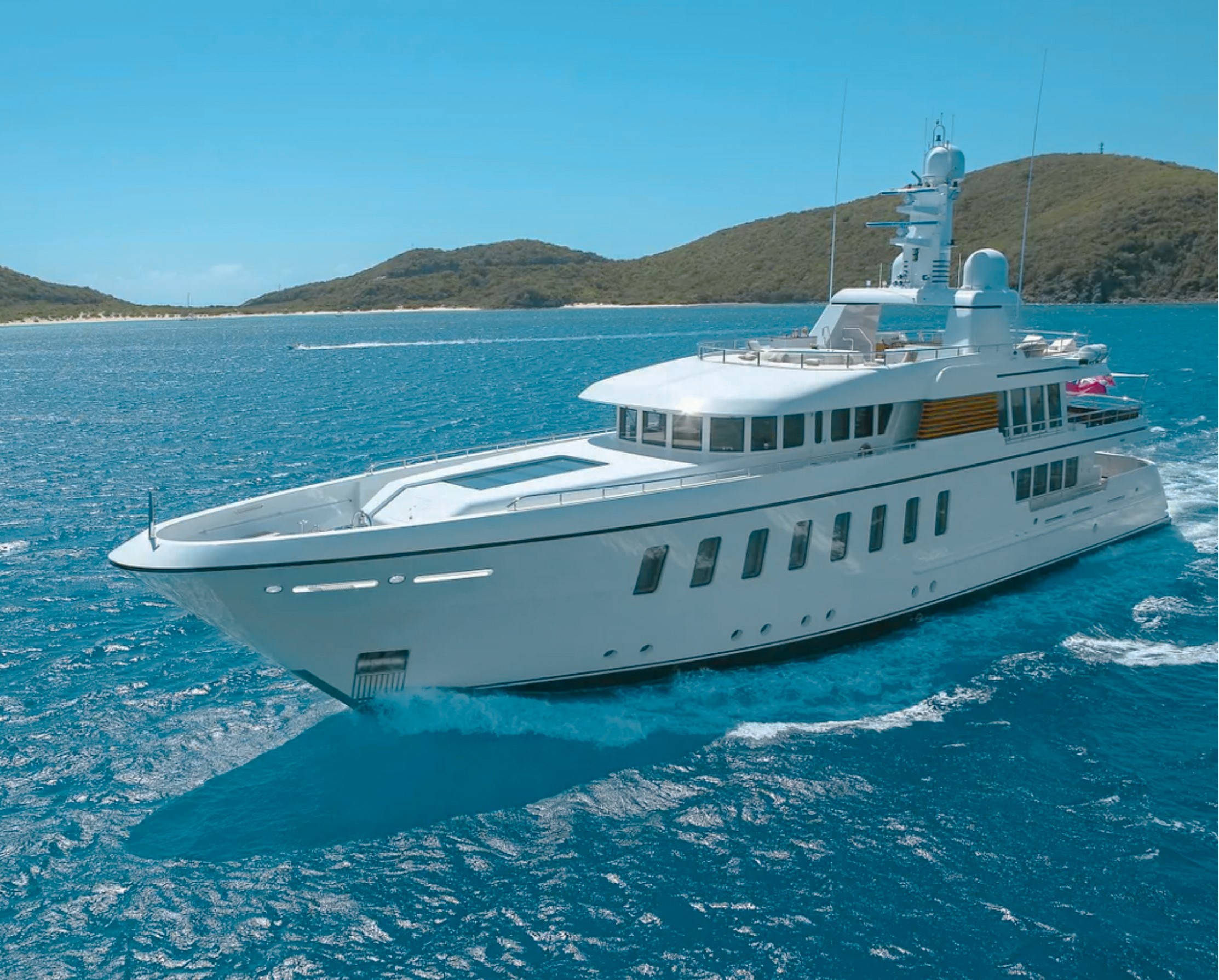 Side view of the 146 Feadship yacht in The Bahamas