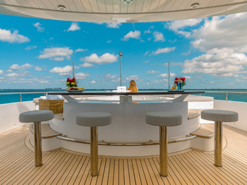 Upper deck and sun lounge area on the 157 Oceanfast yacht