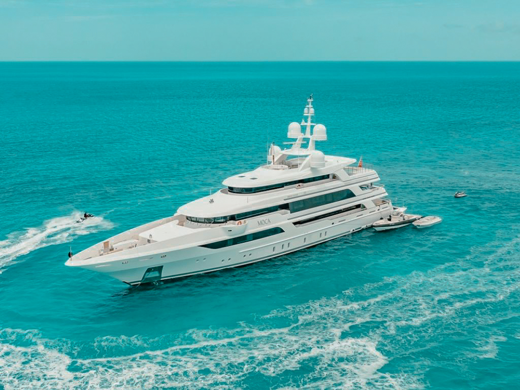 View of the 208 Benetti yacht from the water with a slide