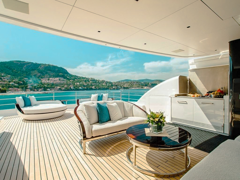 Deck with seating and ocean view from 135 Alia yacht