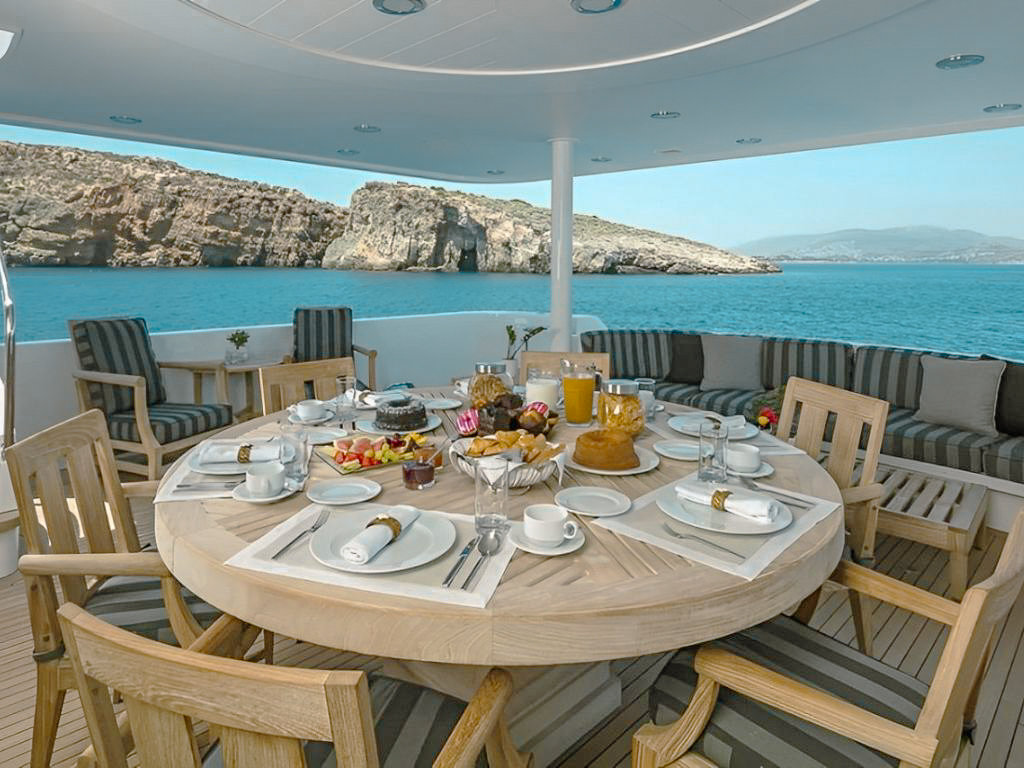 Top deck of 164 Delta yacht with jacuzzi and lounge chairs