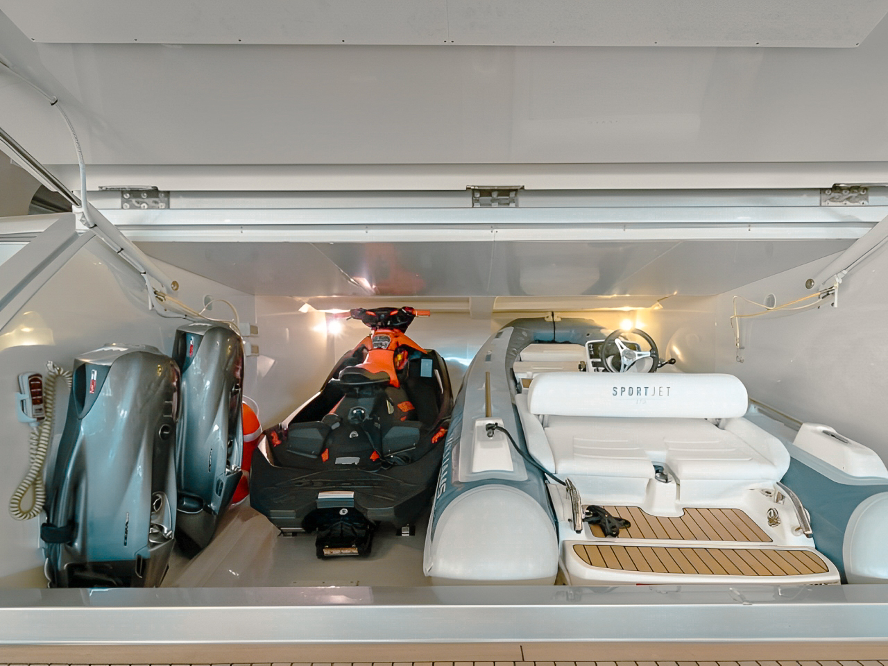 Aft deck of 94 Riva yacht with seating and dining area
