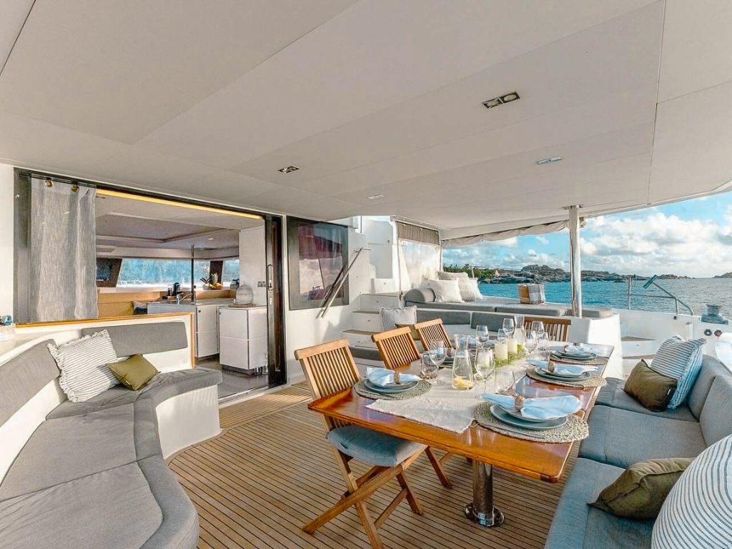 One of the comfortable cabins on 70 Fountaine Pajot II with large bed and natural light