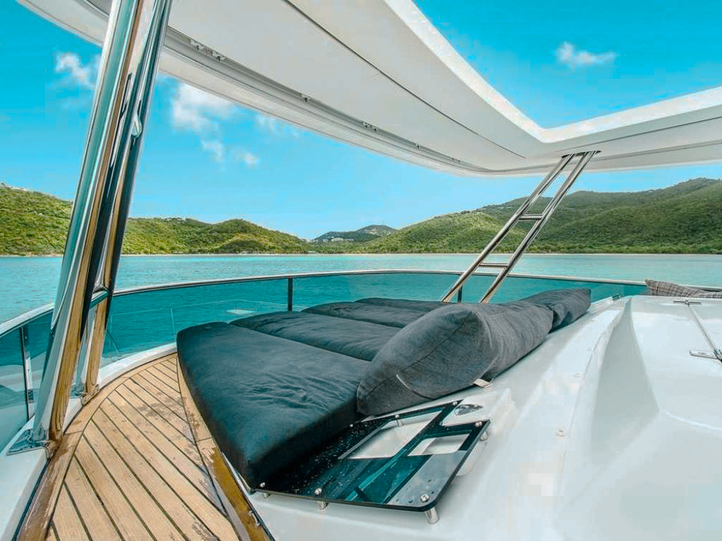 Aft deck of 65 Lagoon II yacht with covered seating and dining area
